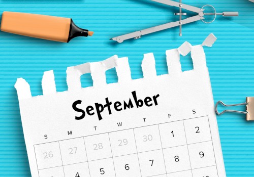 A September calendar page on a blue background with various stationery items like a protractor, highlighter, compass, and tape.